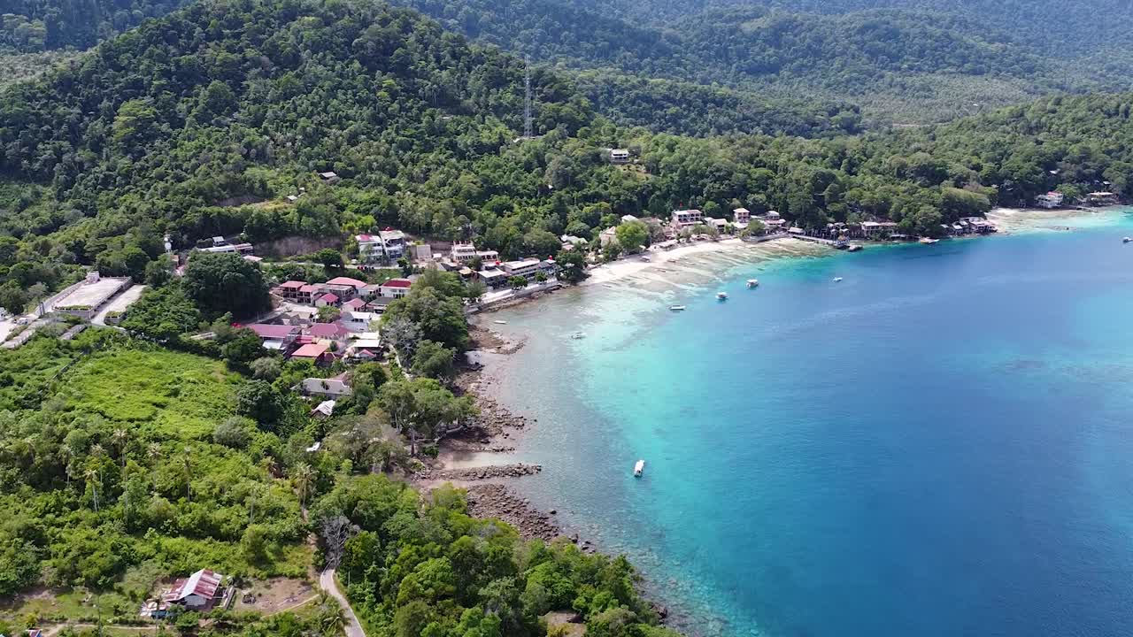 Scenic aerial drone view of Iboih in Pulau Weh, popular snorkeling and diving holiday destination, in Sabang, Aceh, Indonesia