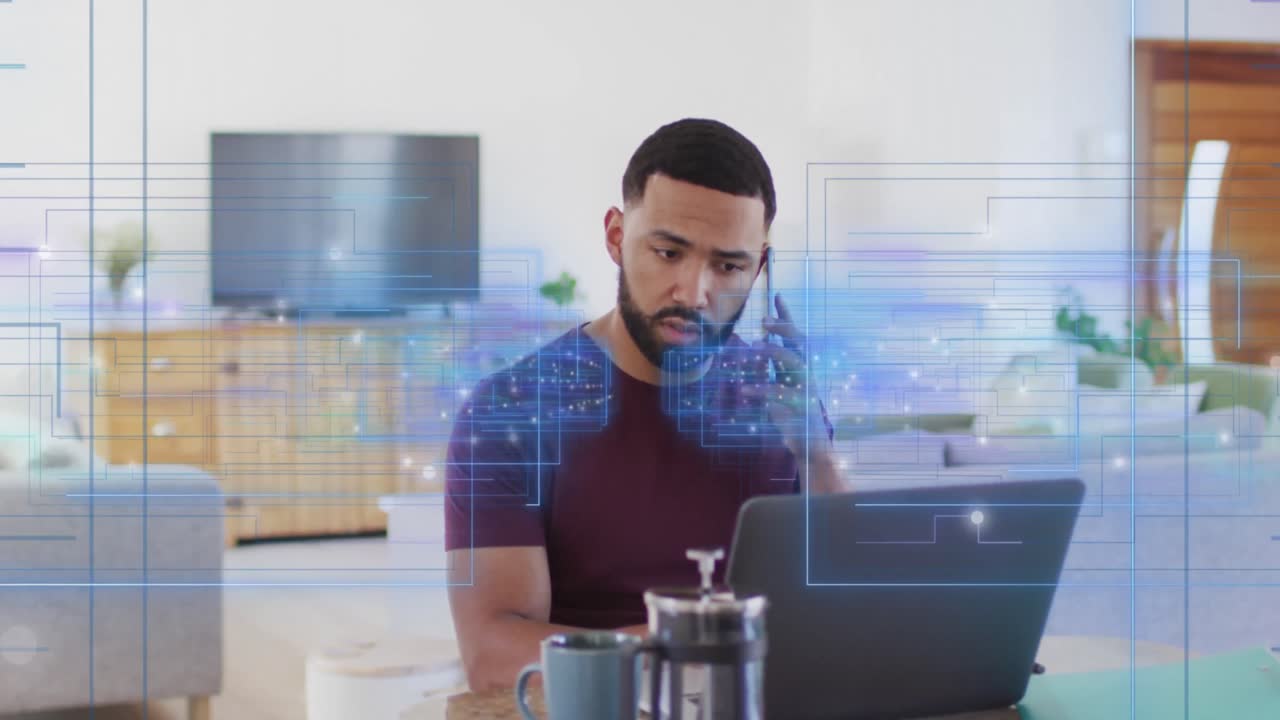 animación de luz y datos sobre un hombre biracial usando teléfono inteligente y computadora portátil
