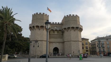 moving shot of landmark serrano towers at summer day in valencia old town, spain