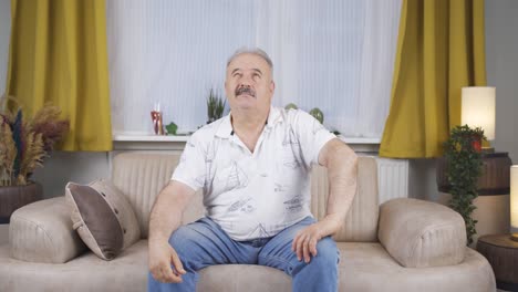 old man nodding in a positive way.