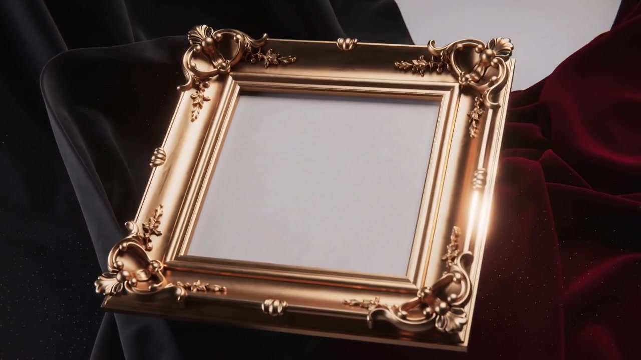 Falling black drape revealing ornate gold picture frame on burgundy velvet, showing blank panel