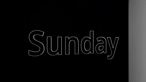 the word sunday in bold text on a dark background