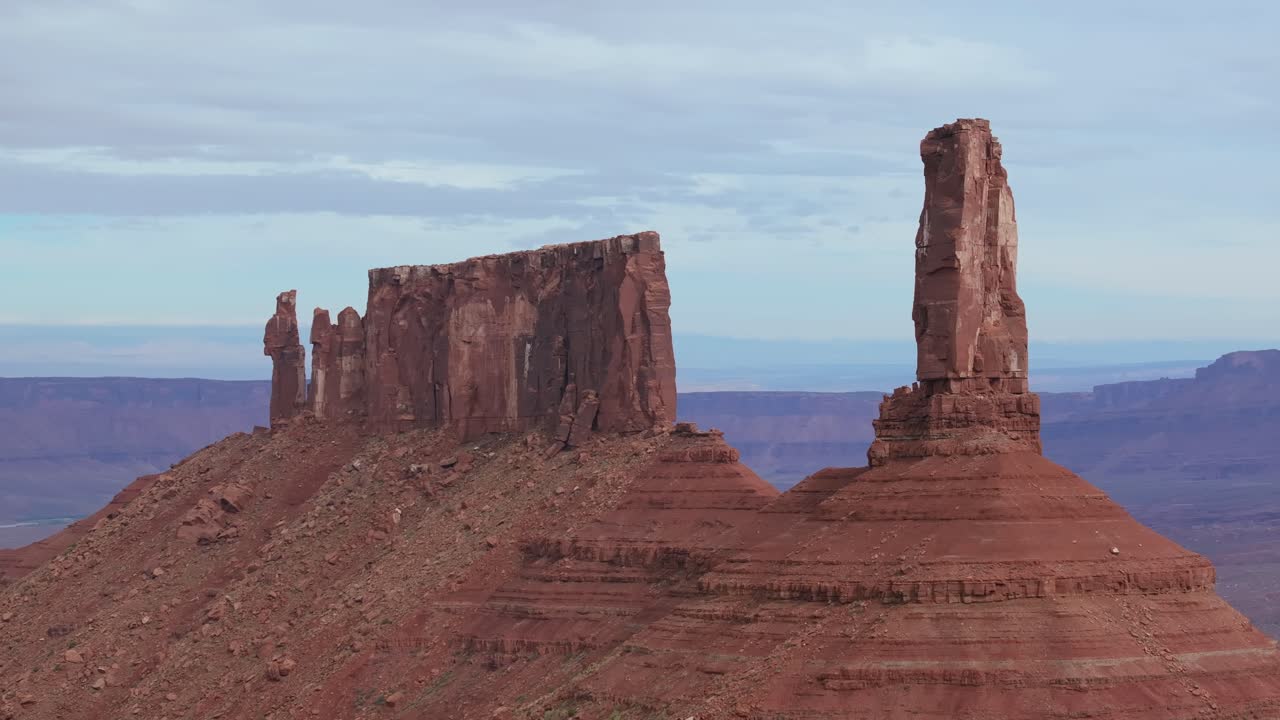 Castleton Tower in Moab standing against dramatic desert backdrop in Utah