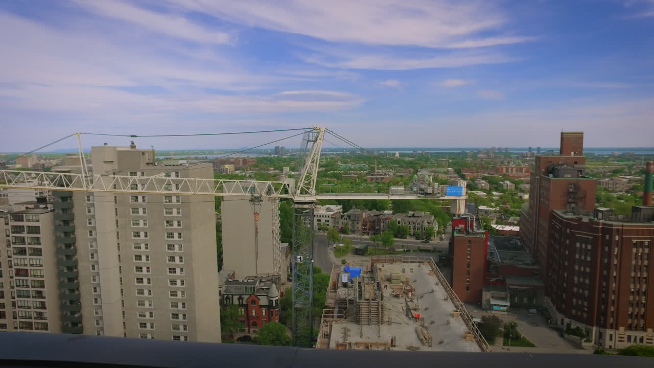 A rooftop view of a city under construction
