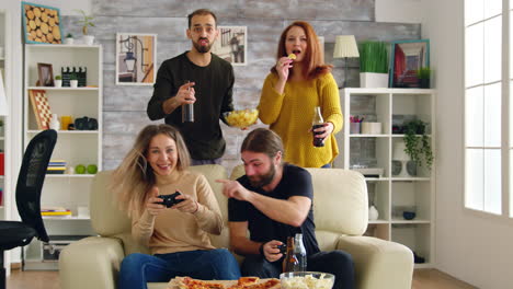 young man and woman cheering up for their friends