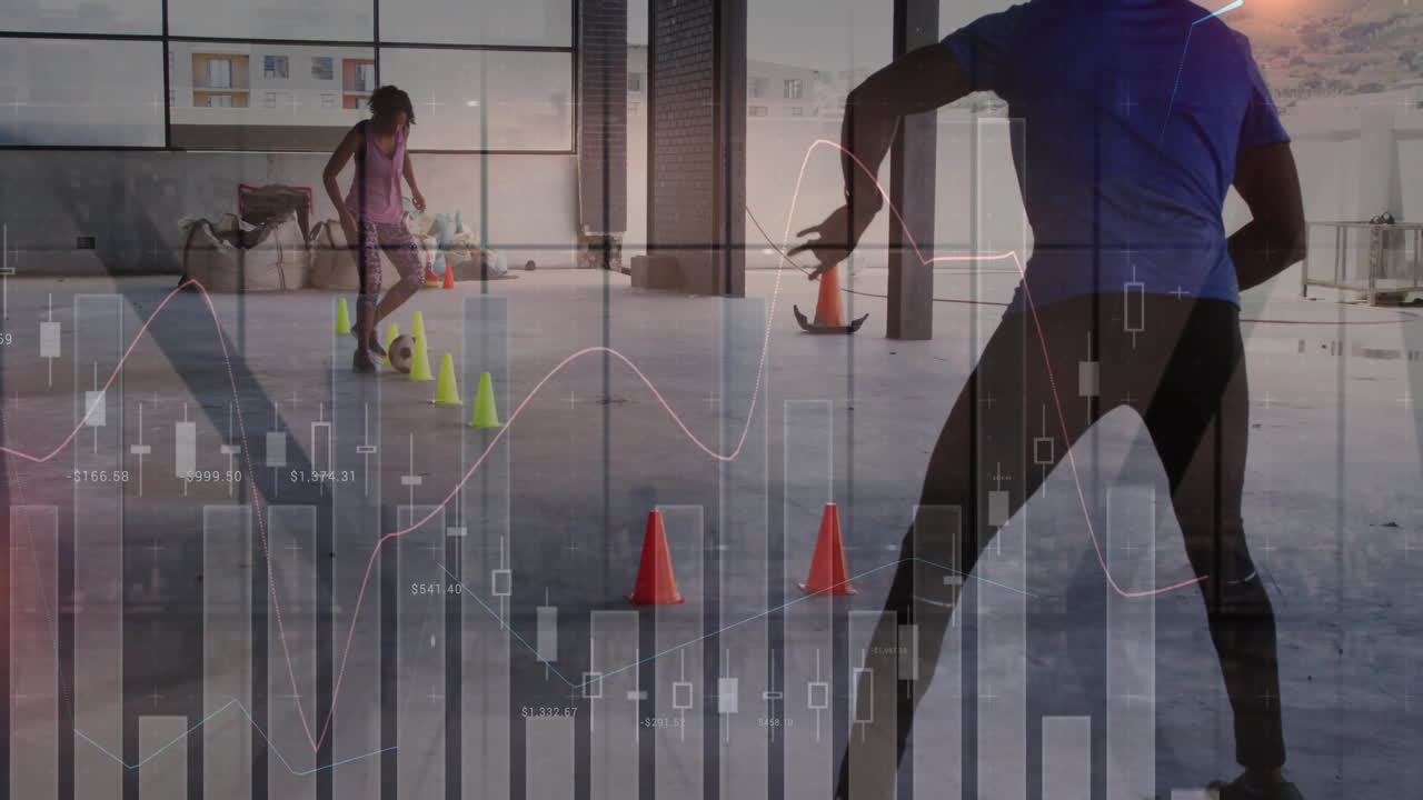 athletes dribbling soccer ball through neon cones in fitness warehouse with animated data