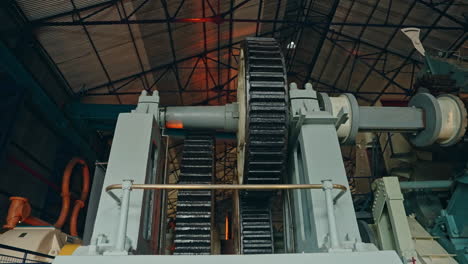 big industrial group of gears working in the machinery