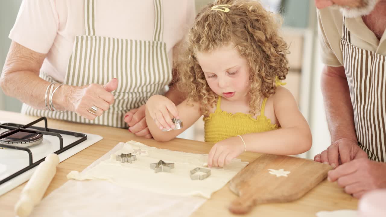Family baking cookies together