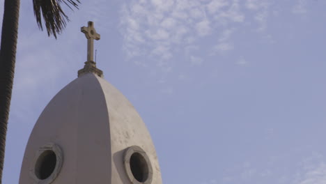 Puerto-Rico-Church-Building-with-Cross-on-Tower---Panning-Low-Angle-Reveal