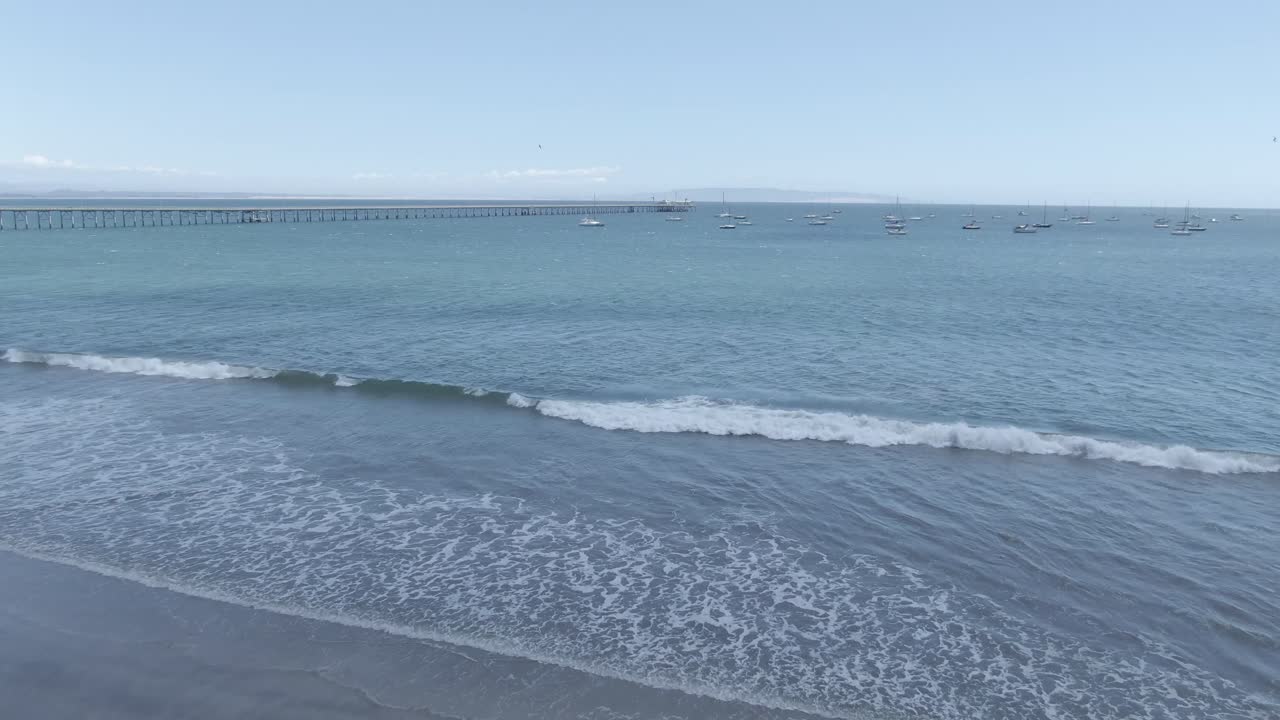 A peaceful drone flight over the calm waters of San Luis Bay at Avila Beach. High-quality 4K footage for background or establishing shots