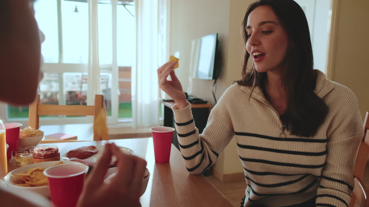 People eating food at a table
