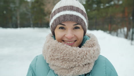 woman smiling in winter park