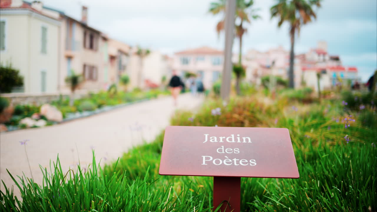 Jardin des Poetes sign at the entrance of the garden in Antibes, France