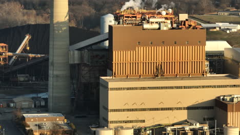 Golden-hour-light-bathes-Flint-Creek-Power-Plant-by-Lake-Swepco,-Arkansas,-industrial-scene