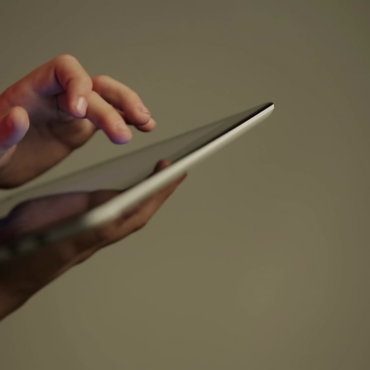 Girl hand touching screen on tablet pc