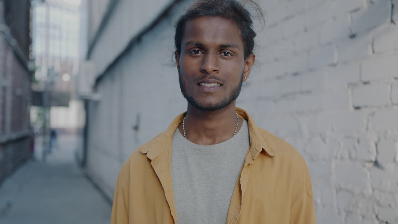 Portrait of a young man in an urban setting