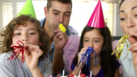 family celebrating a birthtday