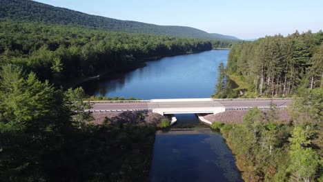 birds eye view to a rural pennsylvania road in a forest