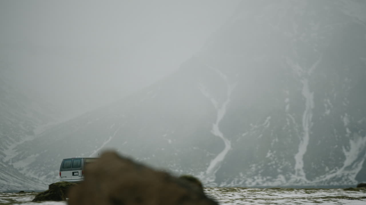 Snowy Icelandic Mountain Landscape with Van