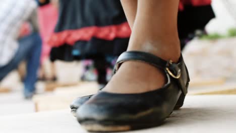 native person doing tap dance in wood box