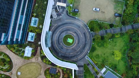 the garden and hall in front of the building