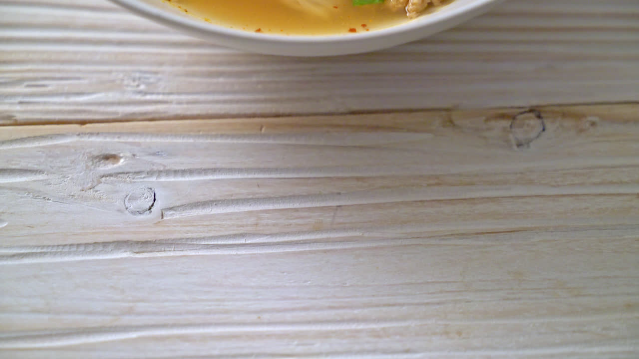 spicy noodles with fish ball and minced pork (Tom Yum Noodles) - Asian food style