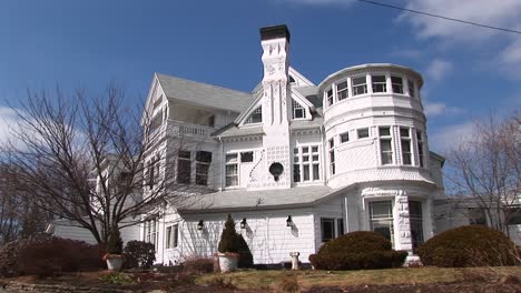 A-Beautiful-Historic-Mansion-Is-Picturesque-Against-A-Blue-Sky