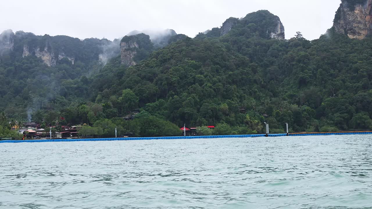 Tropical Island Scenery with Mountains and Pier
