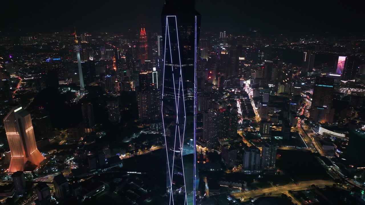 Aerial tilt shot of the Merdeka 118 tower, Independence day night in Kuala Lumpur