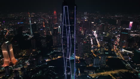 aerial tilt shot of the merdeka 118 tower, independence day night in kuala lumpur