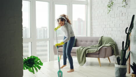 woman cleaning her home with energy