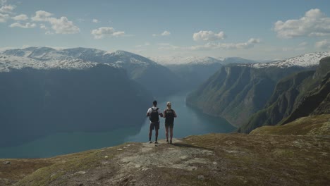 Scenic-view-of-hikers-on-Mount-Prest-trail-in-Norway-during-a-sunny-day