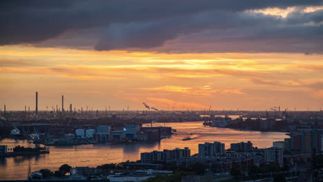 rotterdam industrial skyline at sunset