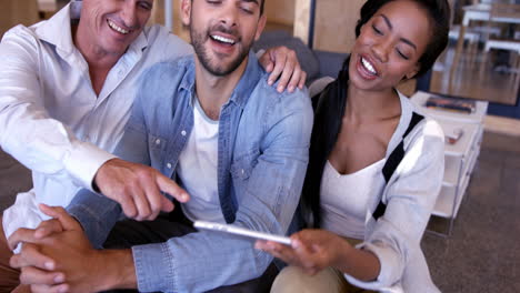 business people taking a selfie together