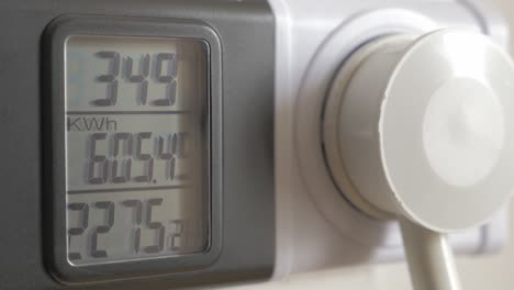 electric power meter metering air conditioner consumption close-up 4k