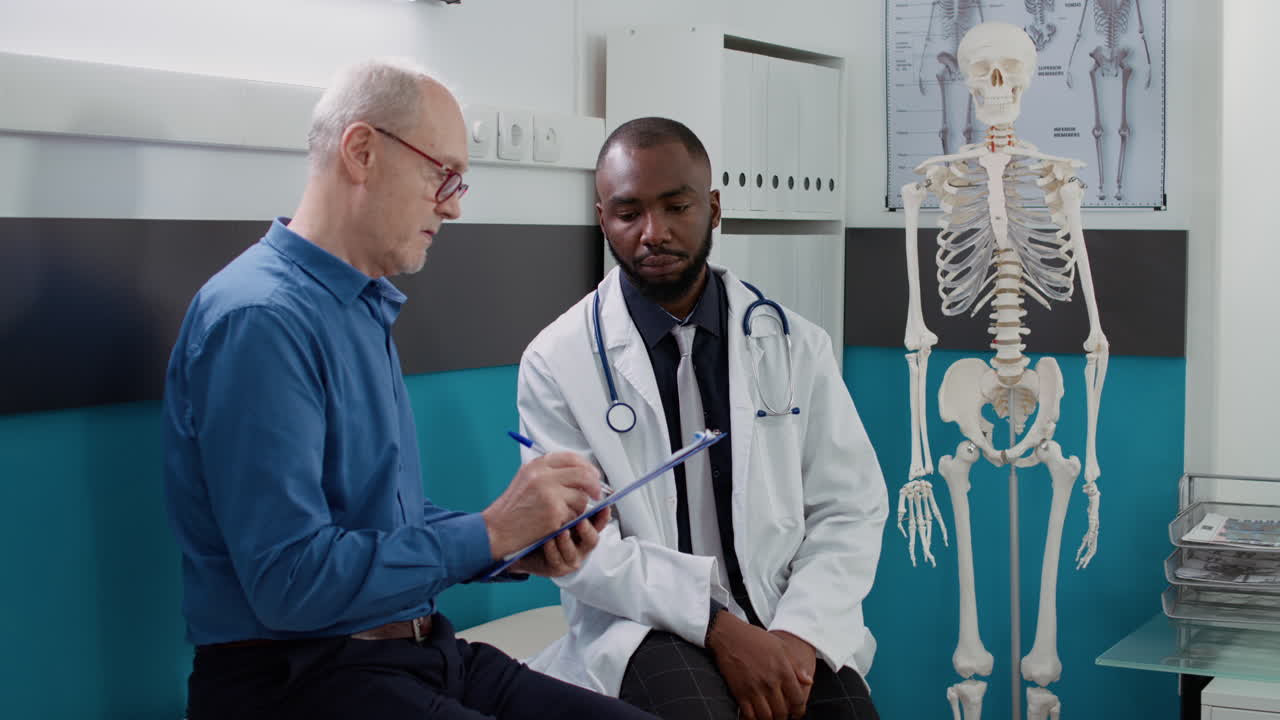 Doctor consulting with patient in clinic