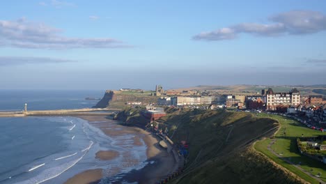 Whitby,-North-York-Moors-sunny-evening-drone-flight-from-west-cliff---vertical-lift---DJI-Inspire-2