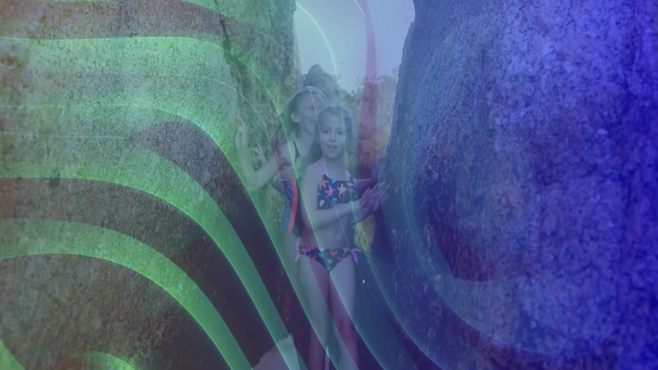 Three siblings climbing granite crevice in education tutorial, displaying green blue wave overlay