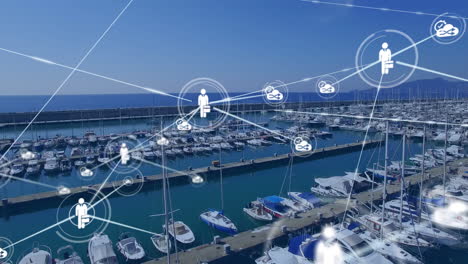 red de iconos digitales contra la vista aérea del puerto portuario