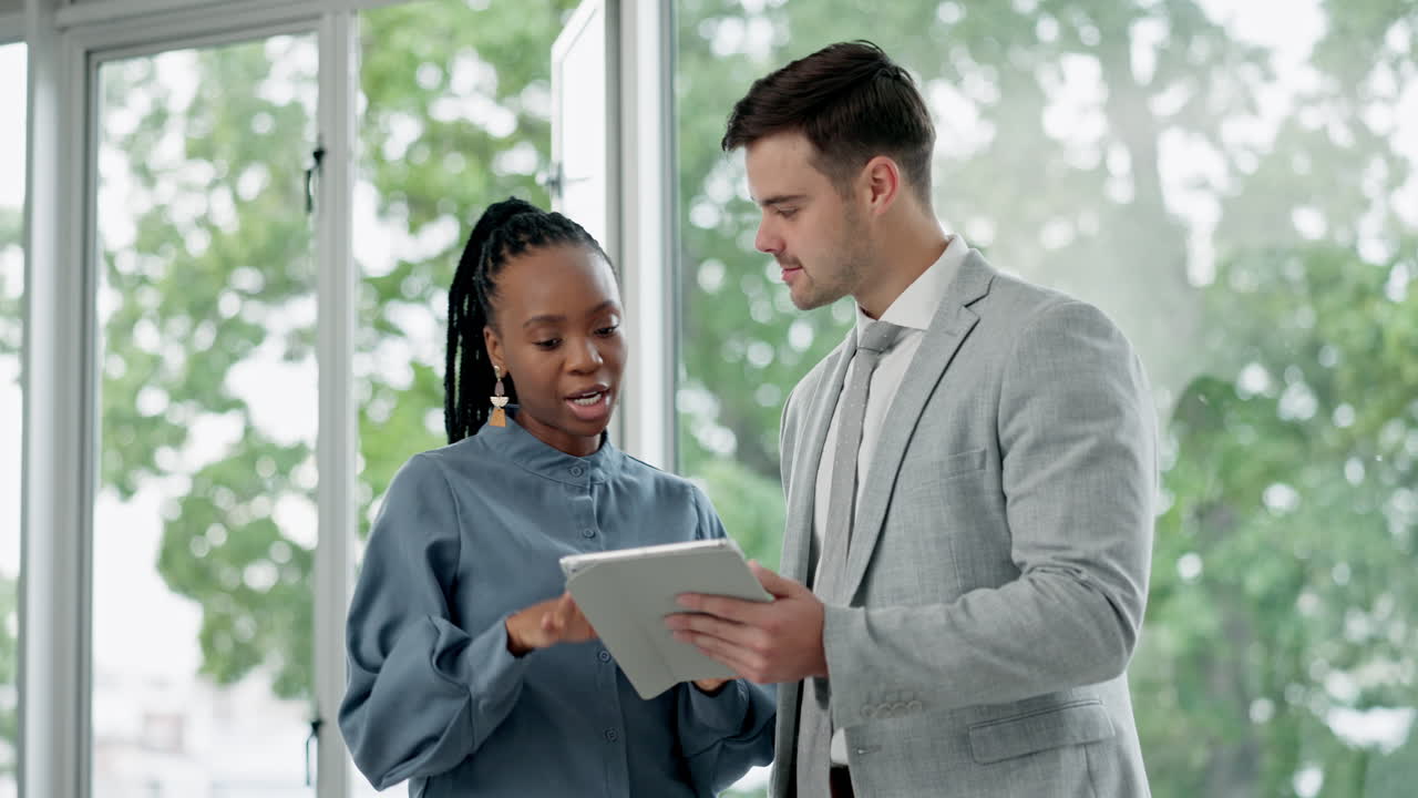 Tablet, teamwork and feedback with business people