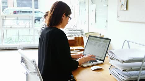 business executive using laptop