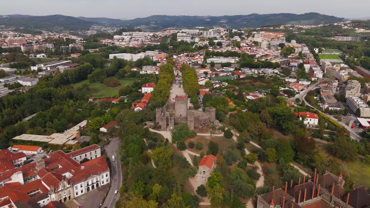 Drone - Guimarães Castle with cityscape and green surroundings in Portugal