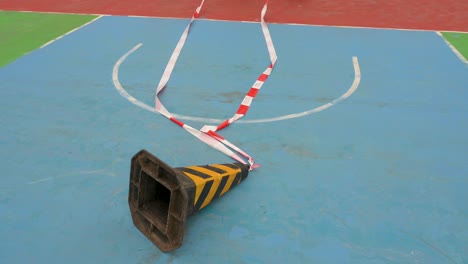 an empty colorful basketball court is seen at a closed playground in hong kong