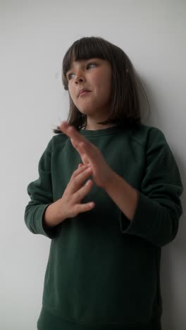 young girl clapping