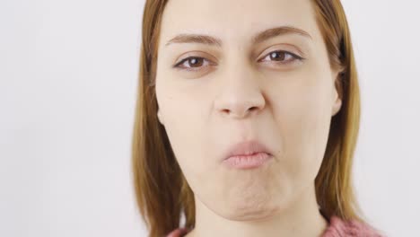 woman eating dried cherries in close-up. dry fruits.