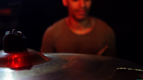 drummer playing on drum set on stage 4k