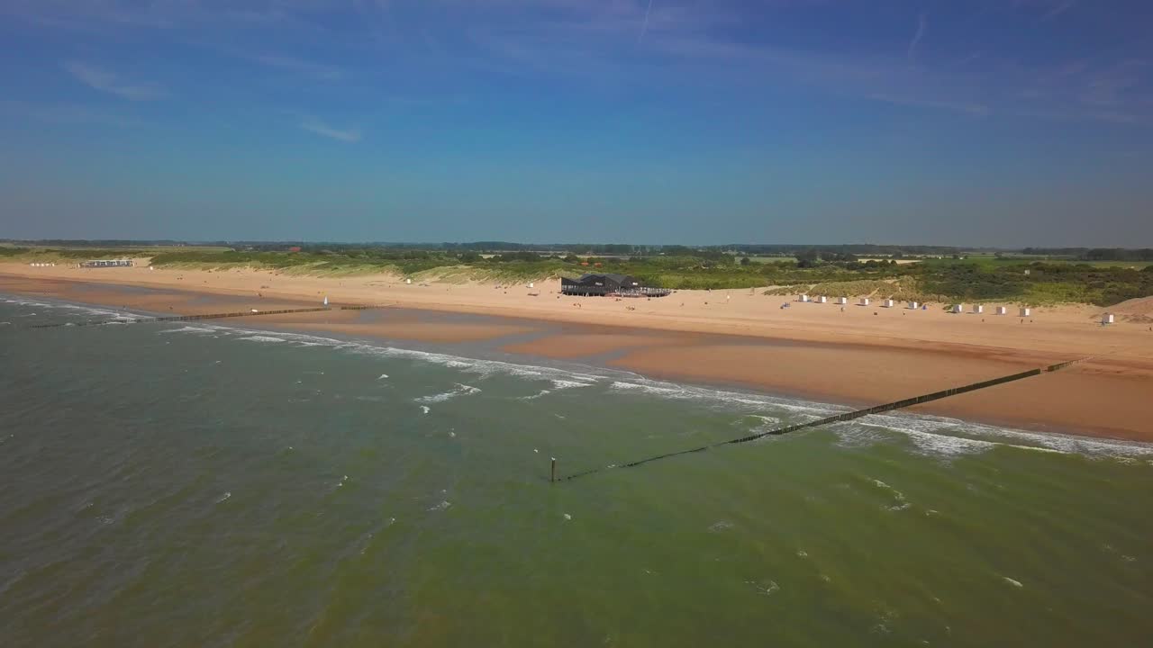 The beach of Cadzand-Bad, the Netherlands during a sunny day. Aerial shot