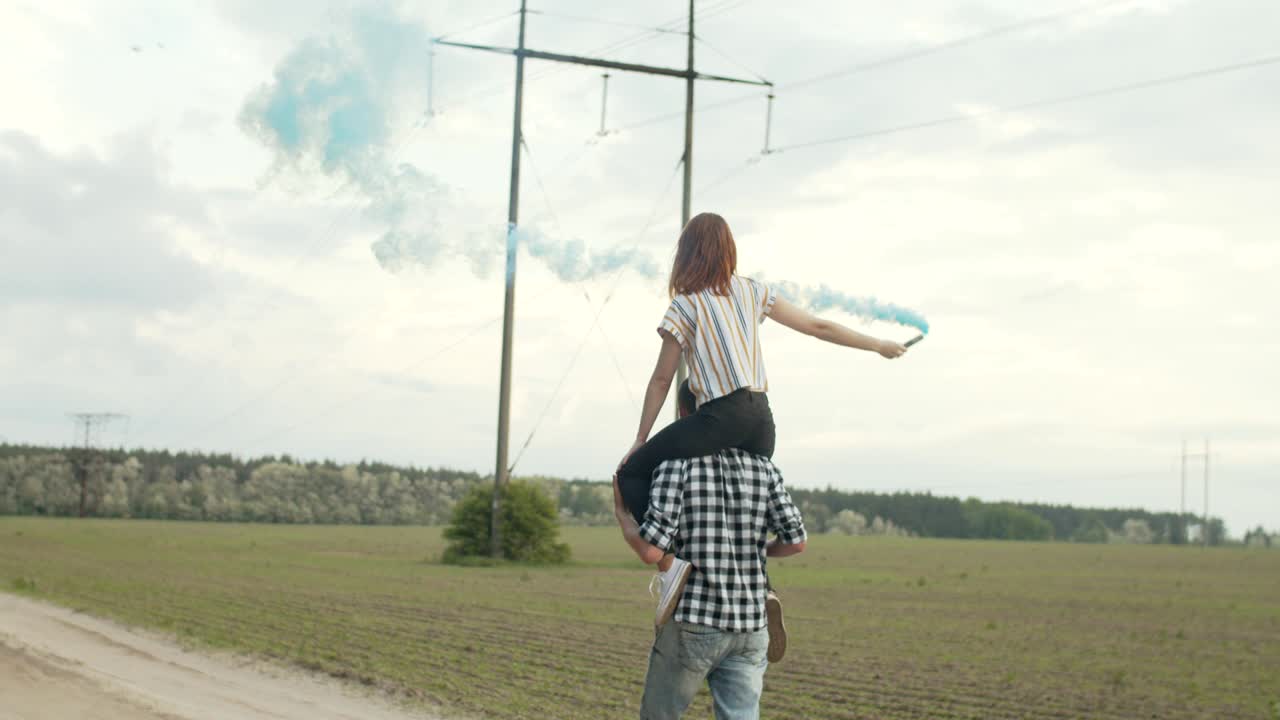 Happy couple having fun during countryside leisure
