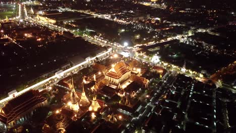 night drone shots of bangkok near wat arun temple, uhd-9