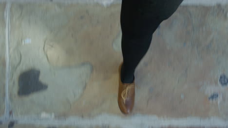 business woman walking on pavement wearing stylish leather shoes strolling casual in city commuting top view